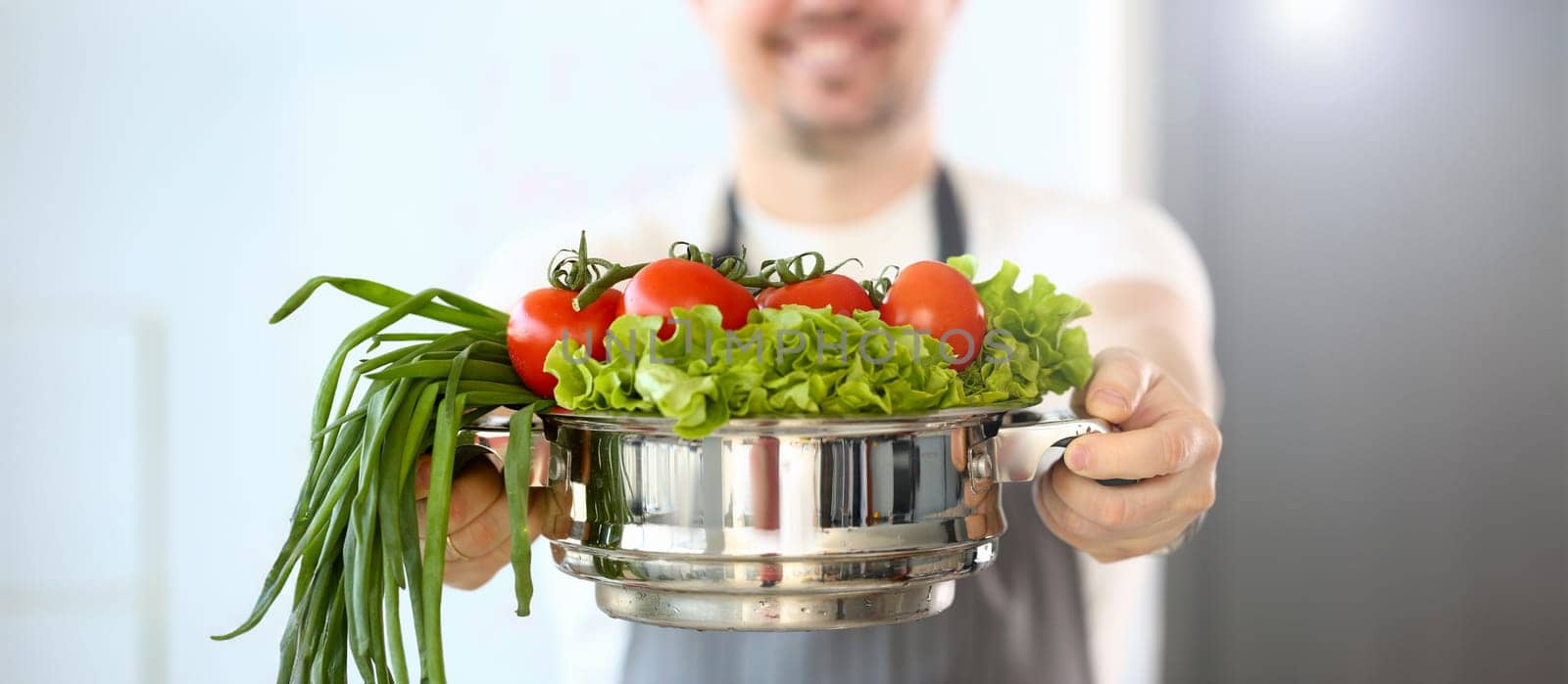 Chef Blogger Holding Vegetable Variety Saucepan by kuprevich