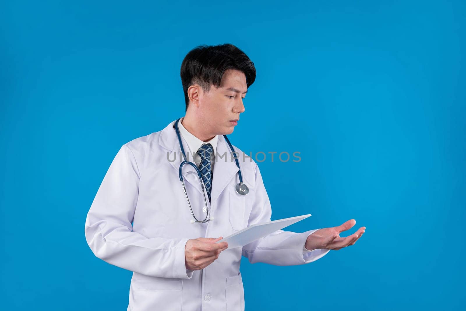 Smart doctor holding transparent tablet hodling object 3D in searching disease research data in futuristic technology attempting remedy therapy healthcare innovation interface hologram. Contrivance.