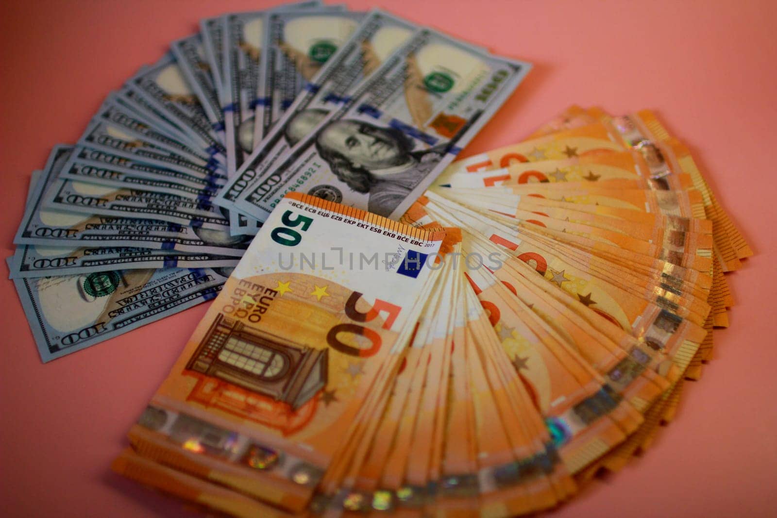A stack of euro and dollar banknotes. High quality photo