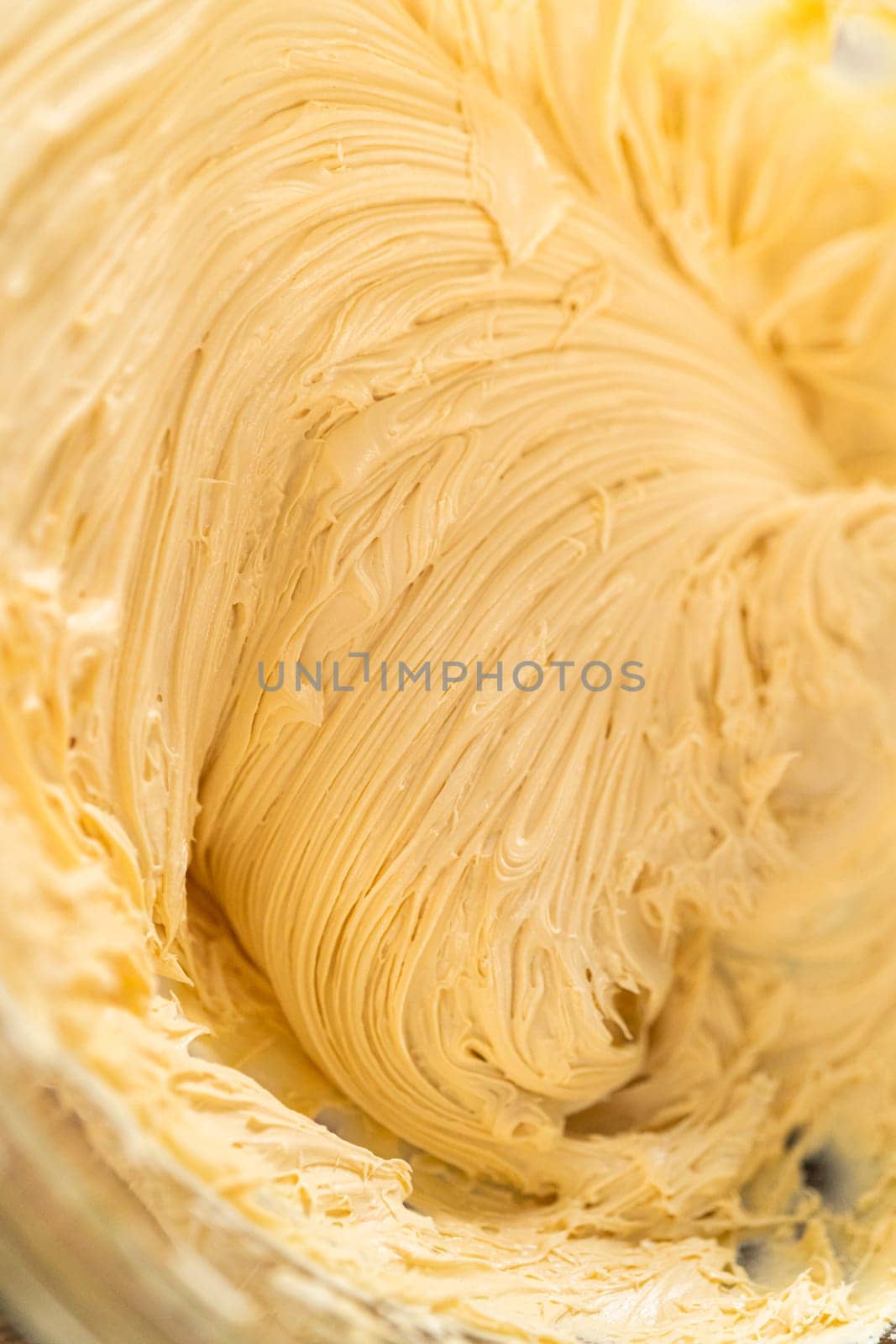 Whipping up salted caramel buttercream frosting for the gingerbread bundt cake.
