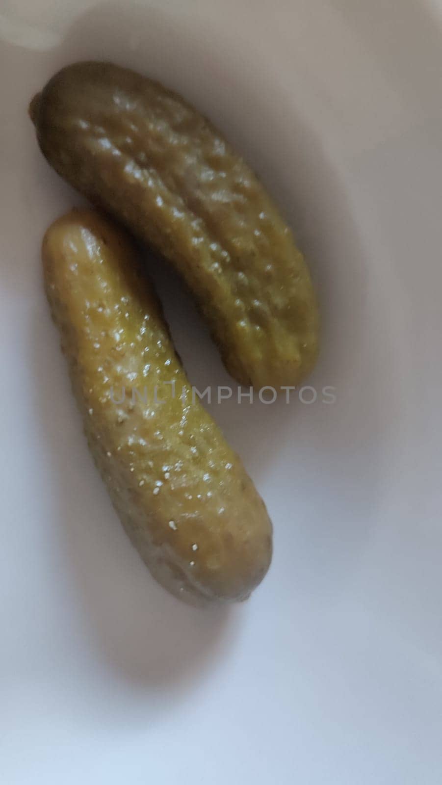 pickled cucumbers, gherkins, food, white background . High quality photo