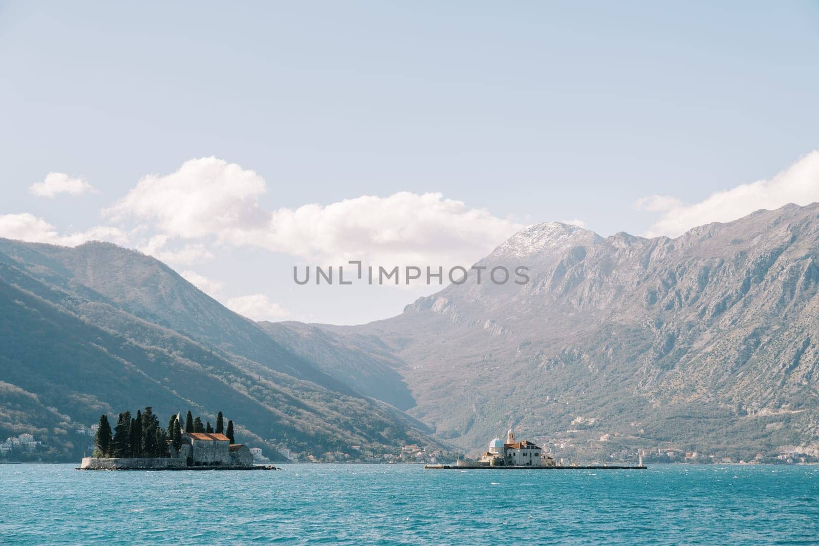 Islands of St. George and Gospa od Skrpjela in the Bay of Kotor with the mountains in the background. Montenegro. High quality photo