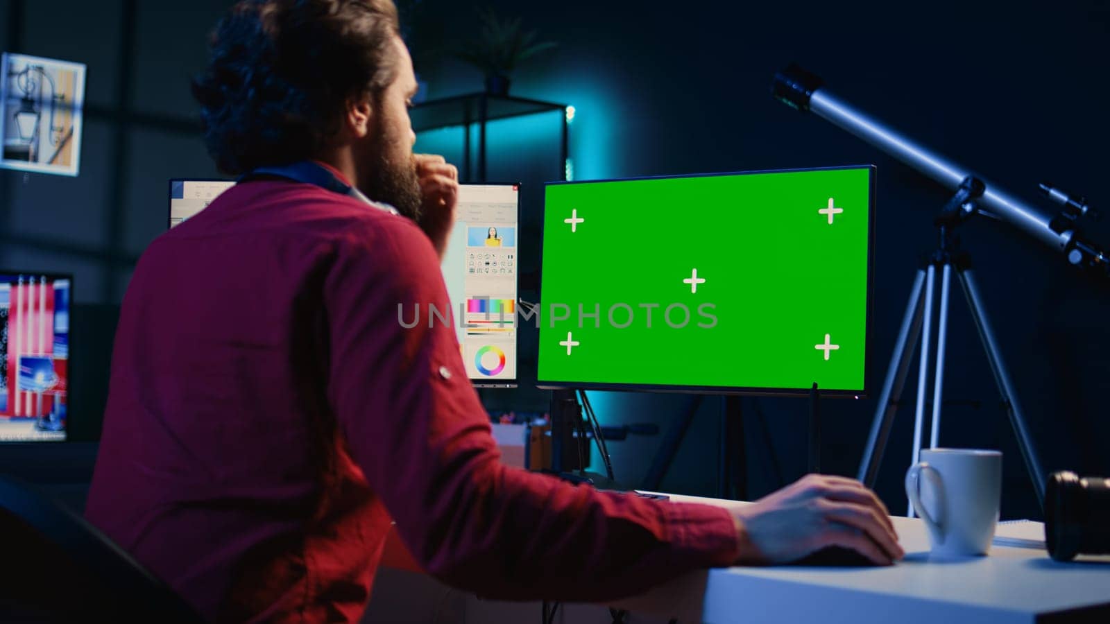 Photo editor using mockup PC monitor to color correct photographs in creative media agency. Photographer selecting best pictures for editorial content with isolated screen computer display