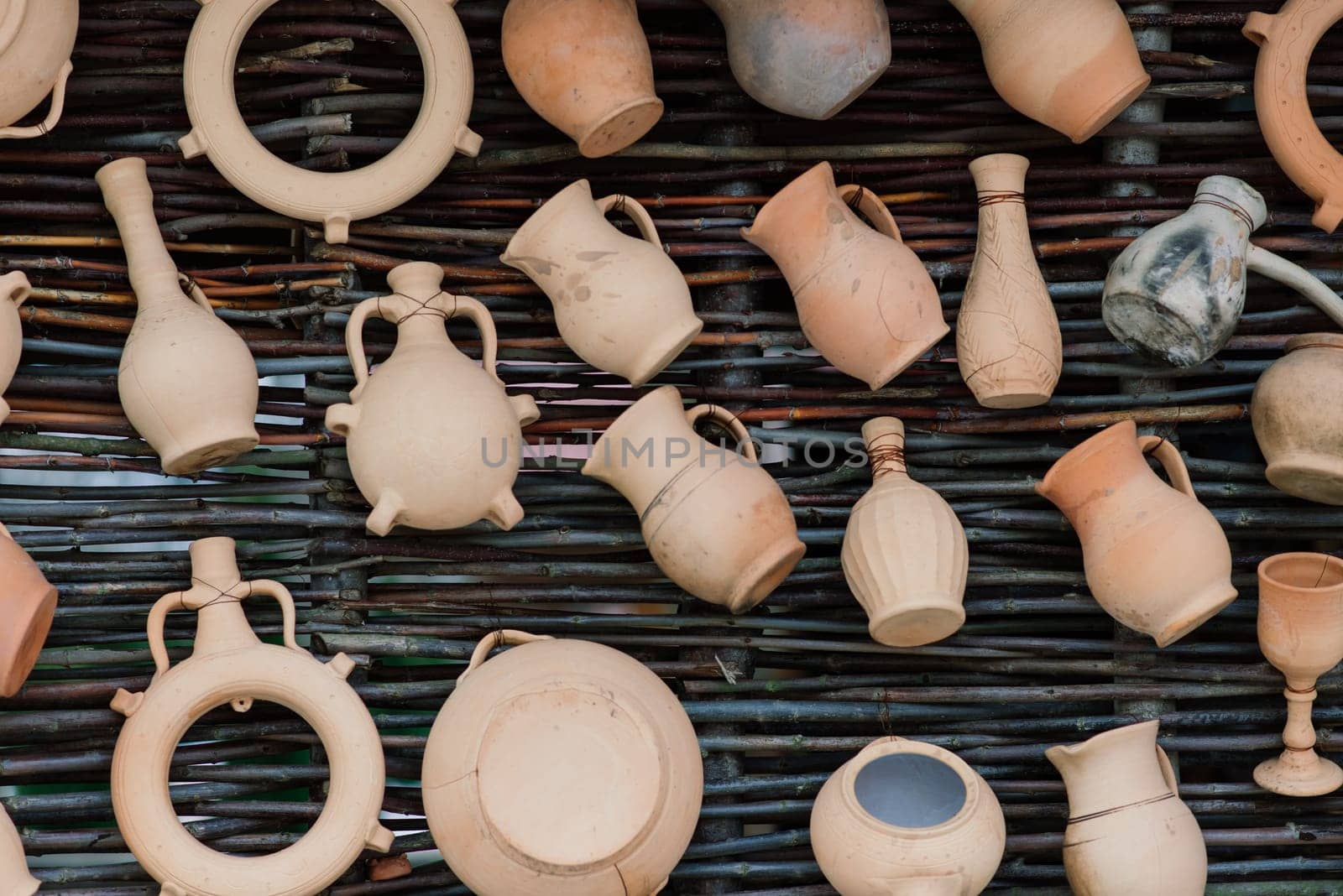Ceramic clay terracotta jug, pot, vase, kitchen souvenirs in handmade ceramics street store.