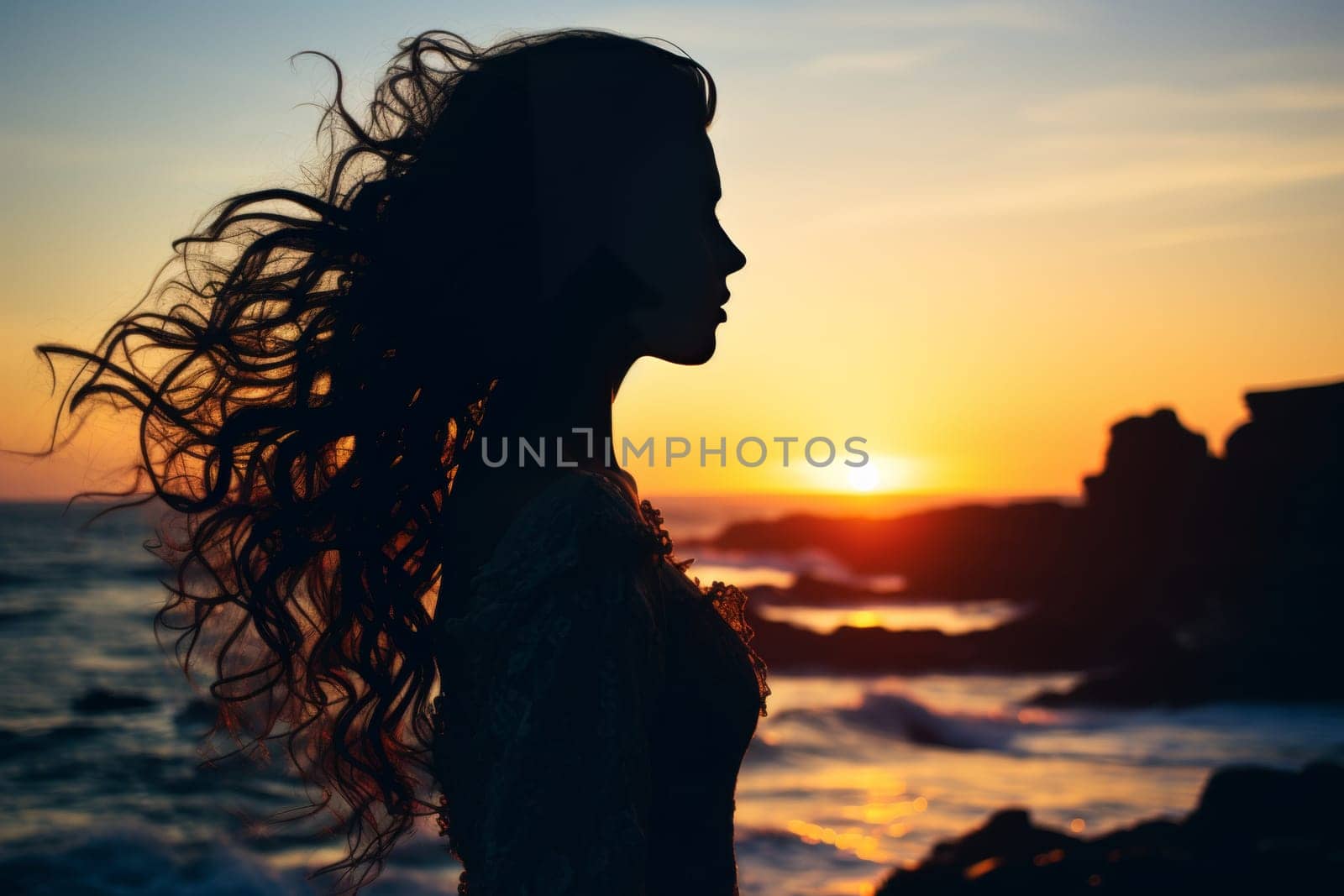 Stunning double exposure of womans silhouette with amazing ocean sunset in background