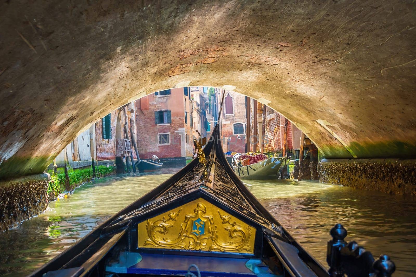 Venice cityscape and canal with gondola ride  in Italy