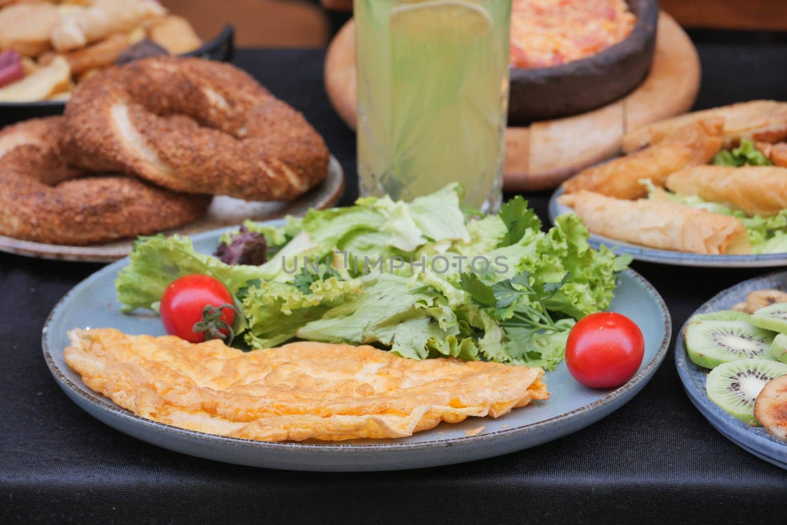 eating Plain Egg Omelette on table .