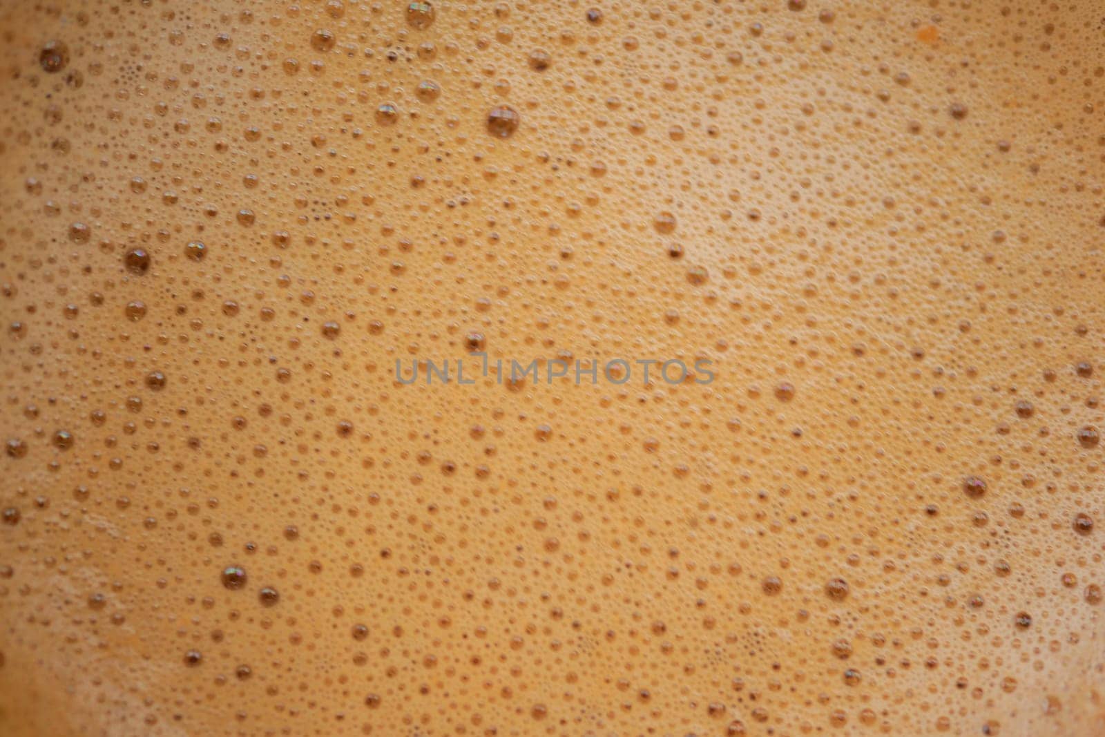 top view of hot coffee with bubble on white background ,