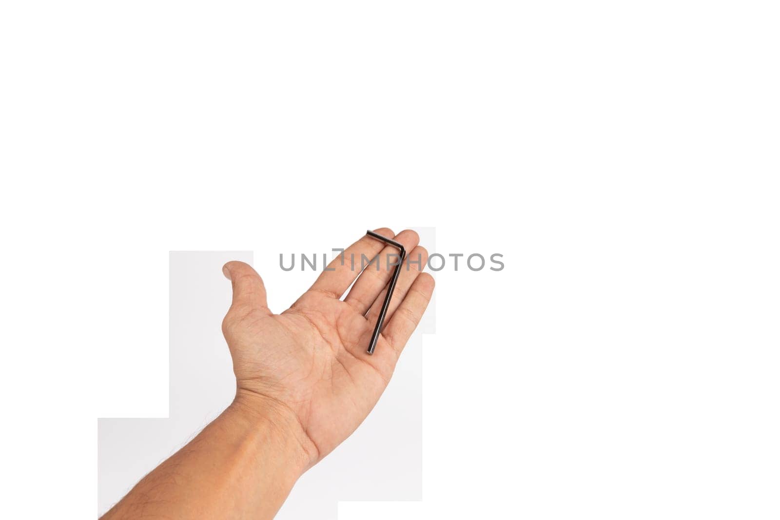 Black male hand holding an allen key isolated no background, cutout. High quality photo