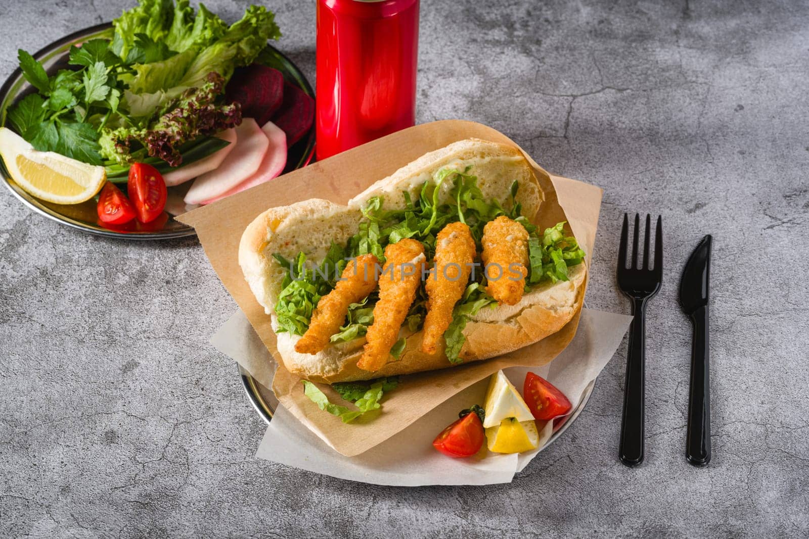 Deep fried shrimp in bread with greens on the side. Shrimp sandwich by Sonat