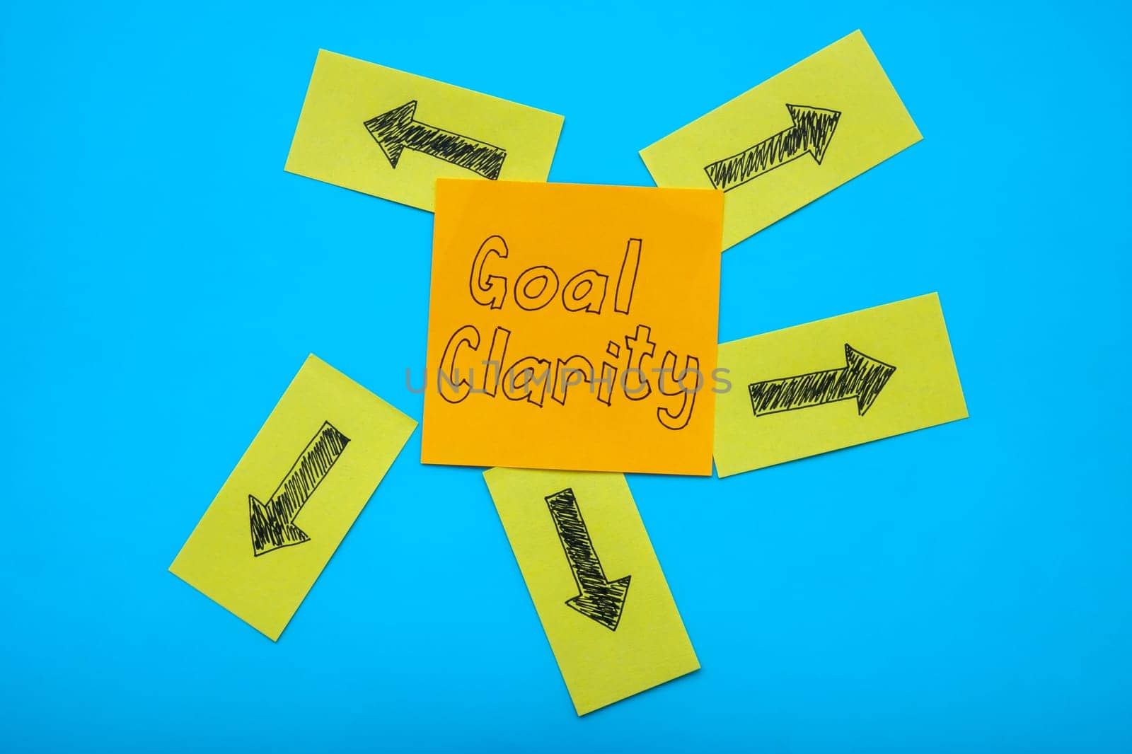 Goal clarity abstract. Stickers with arrows and one with inscription.