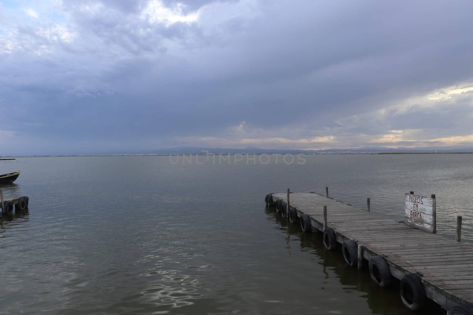 Natural Park of the Albufera in Valencia (Spain). Sunset in a cloudy day