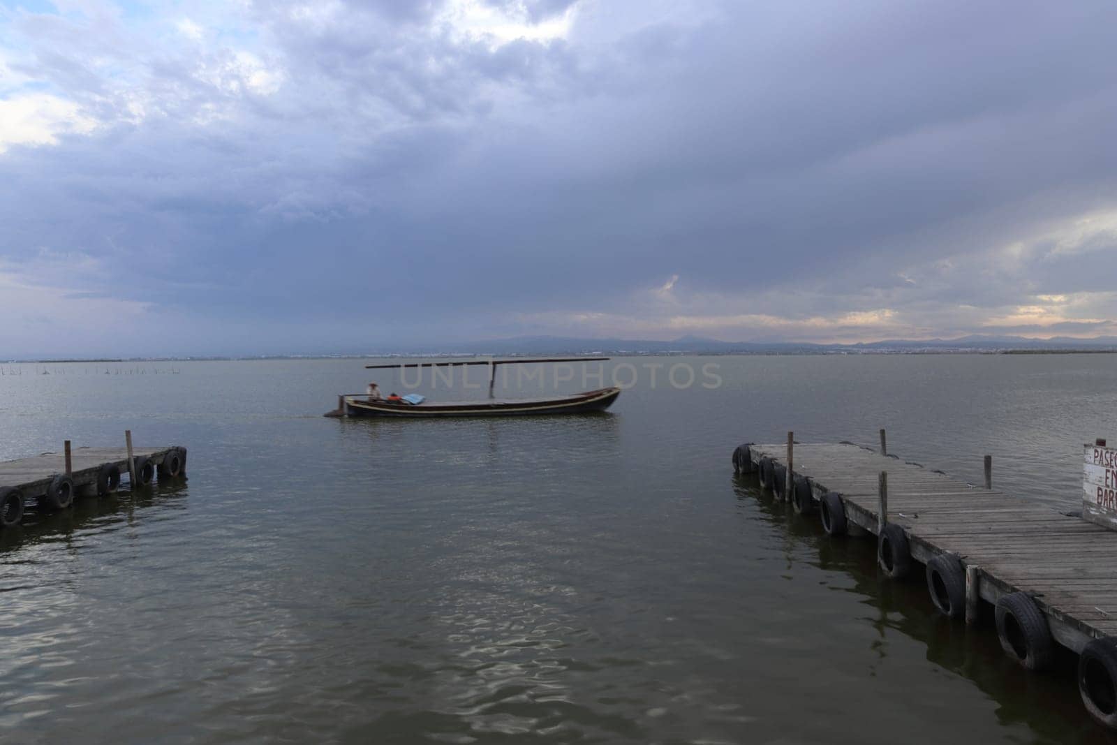 Natural Park of the Albufera in Valencia (Spain). Sunset in a cloudy day