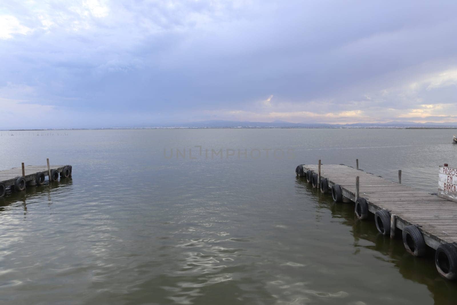 Natural Park of the Albufera in Valencia (Spain). Sunset in a cloudy day