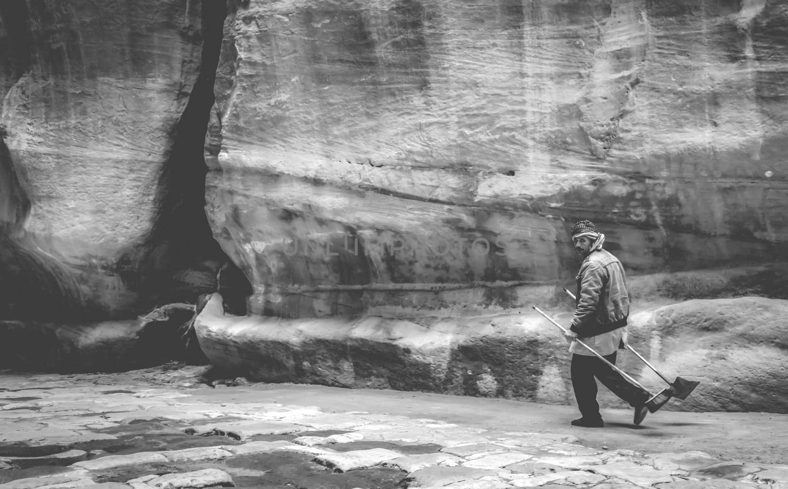 Pertra, Jordan - 29 March 2019: Al-Siq canyon - path to Petra Treasury, Petra, Jordan with person