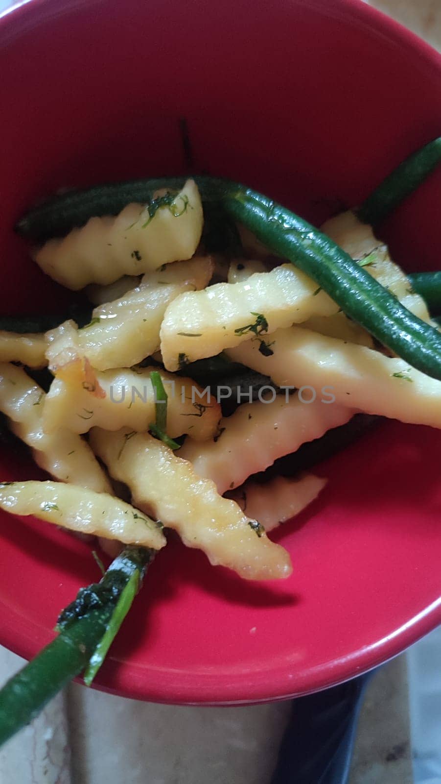 red bowl, fork chips food dinner. High quality photo