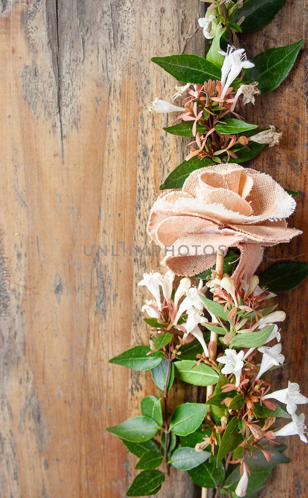 Grunge wood texture with empty space white and pinnk flowersbouquet.Romantic concept Copy space