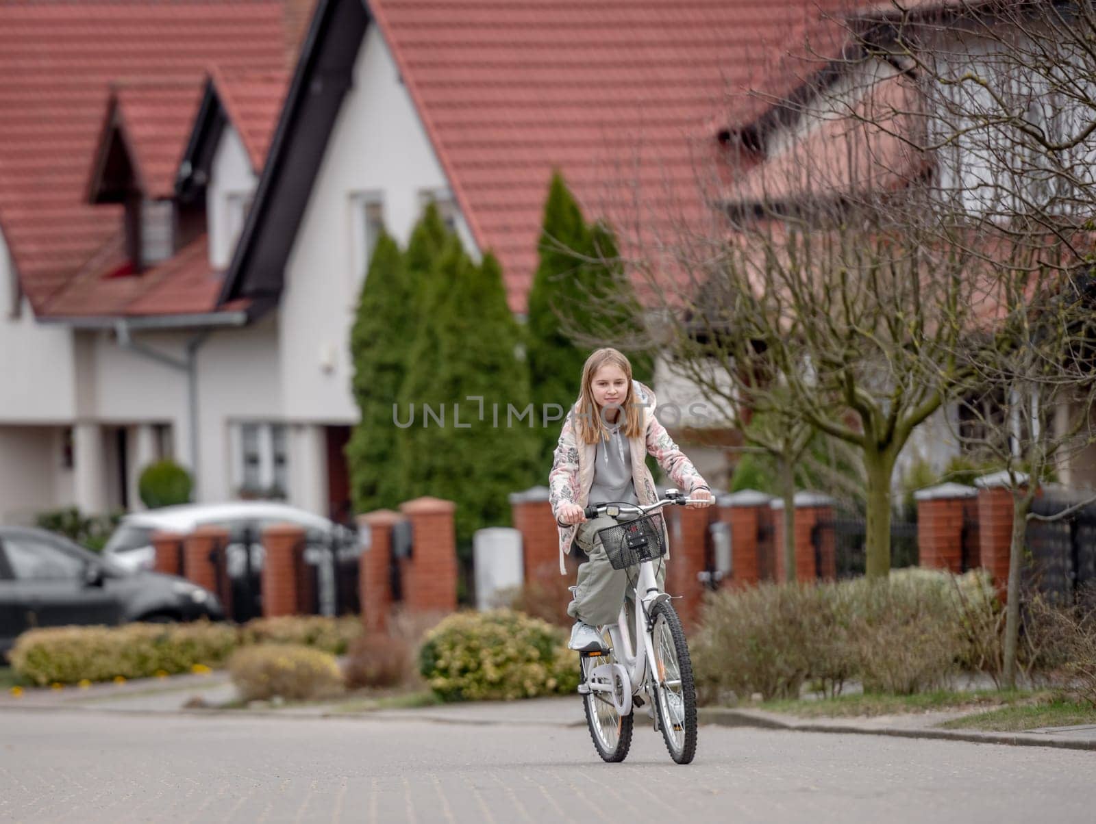Girl Rides Bike Among Private Homes In Europe by tan4ikk1