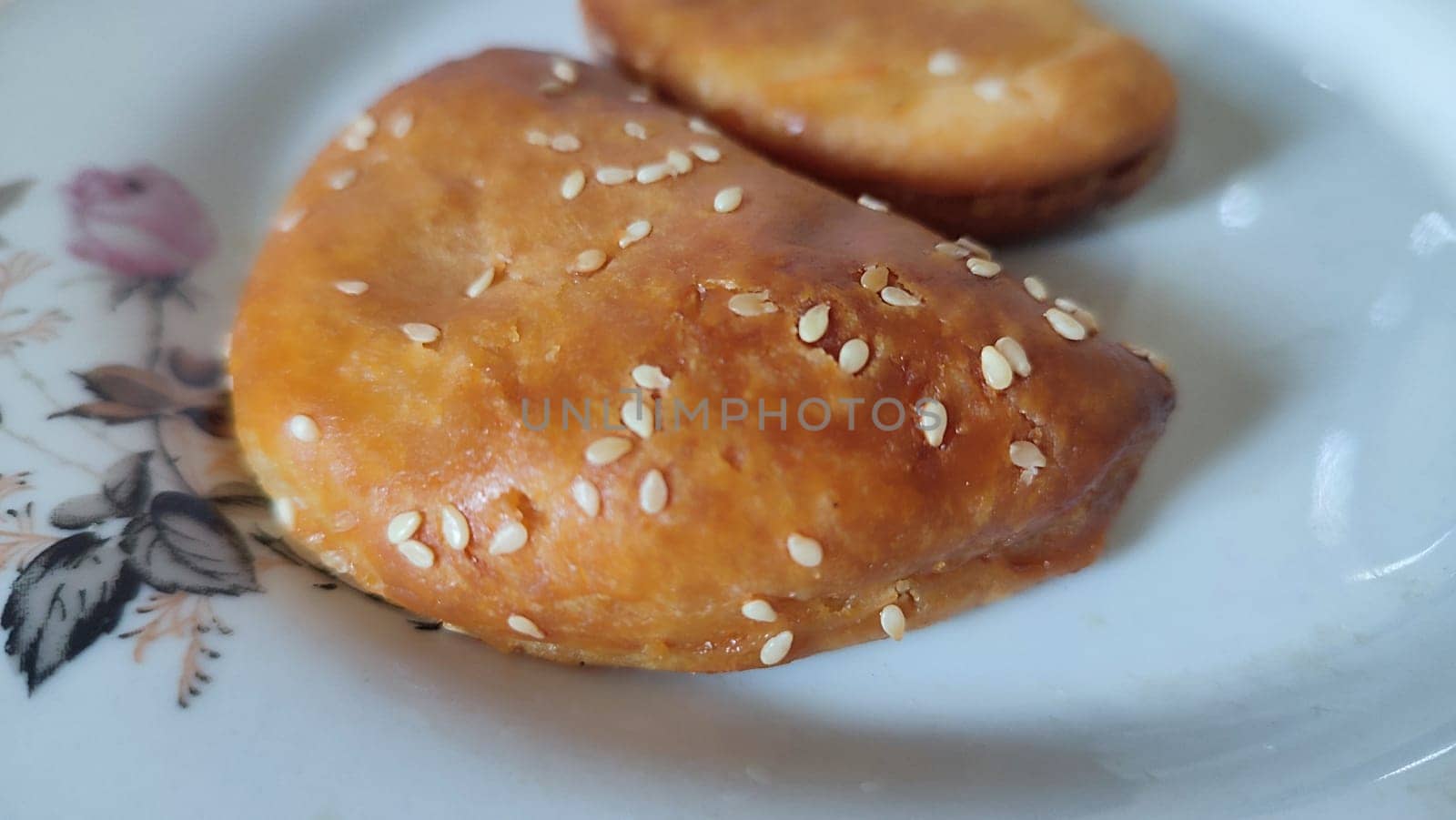 baking pie with sesame seeds on a plate. High quality photo