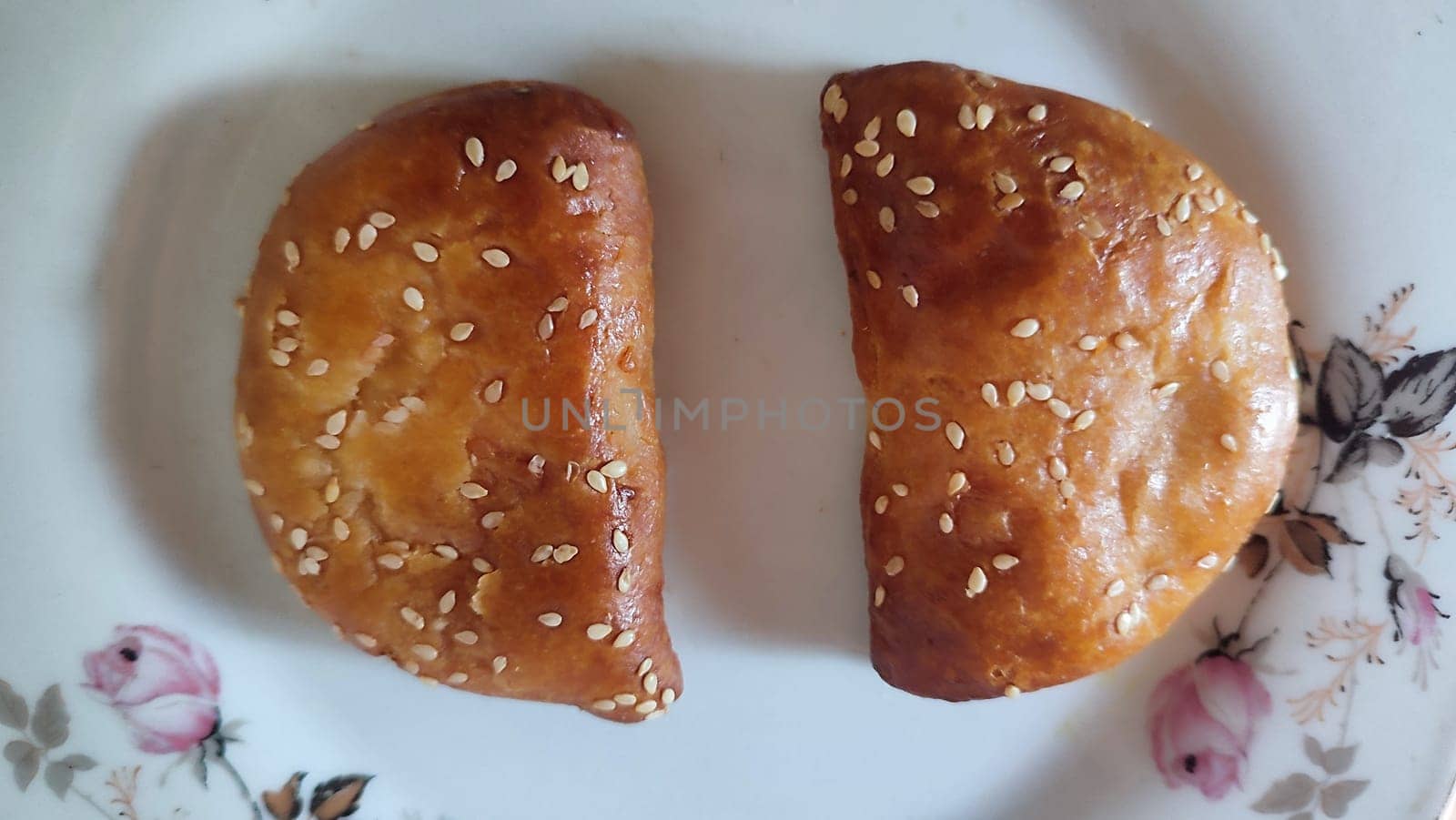 baking pie with sesame seeds on a plate. High quality photo