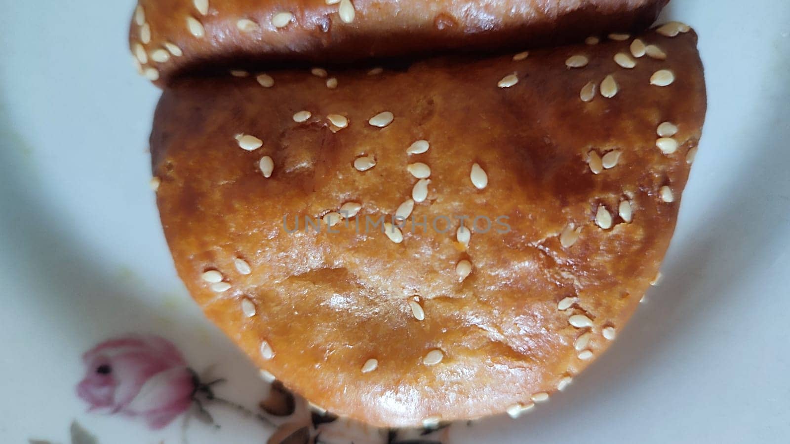 baking pie with sesame seeds on a plate. High quality photo
