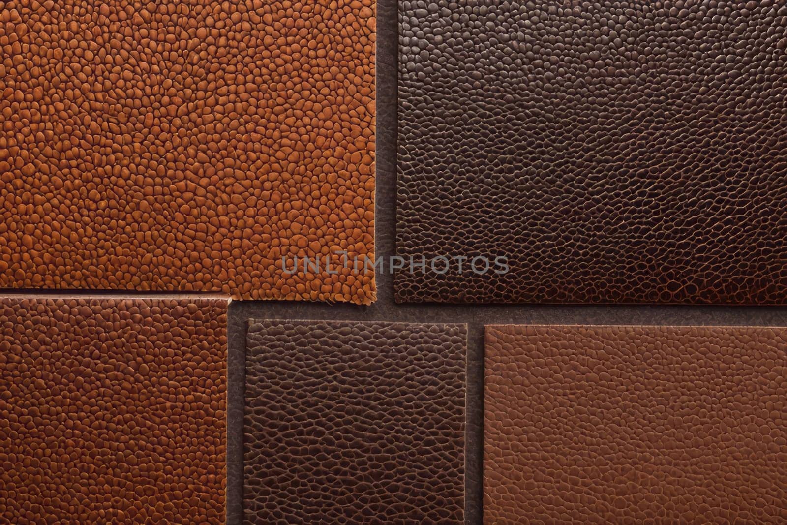 Intriguing close-up composition featuring various brown leather textures