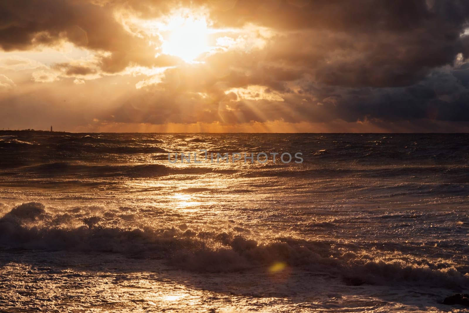 landscape storm on sea and sunset with clouds