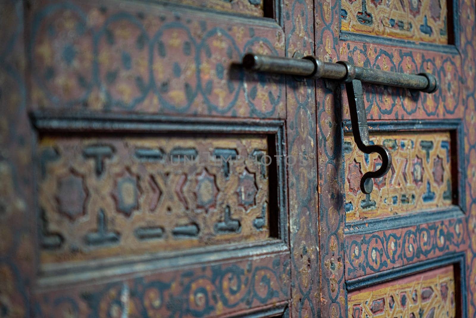 Details of an ancient Arabic door and its lock in Morocco