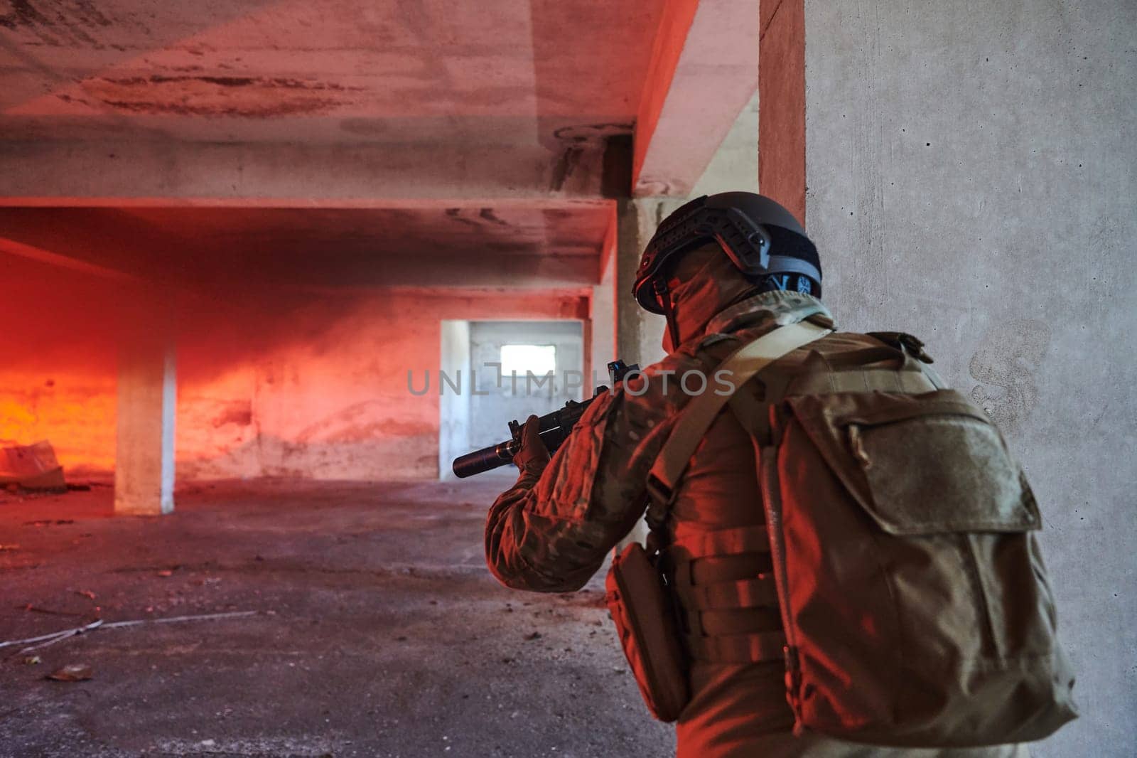 A group of professional soldiers bravely executes a dangerous rescue mission, surrounded by fire in a perilous building