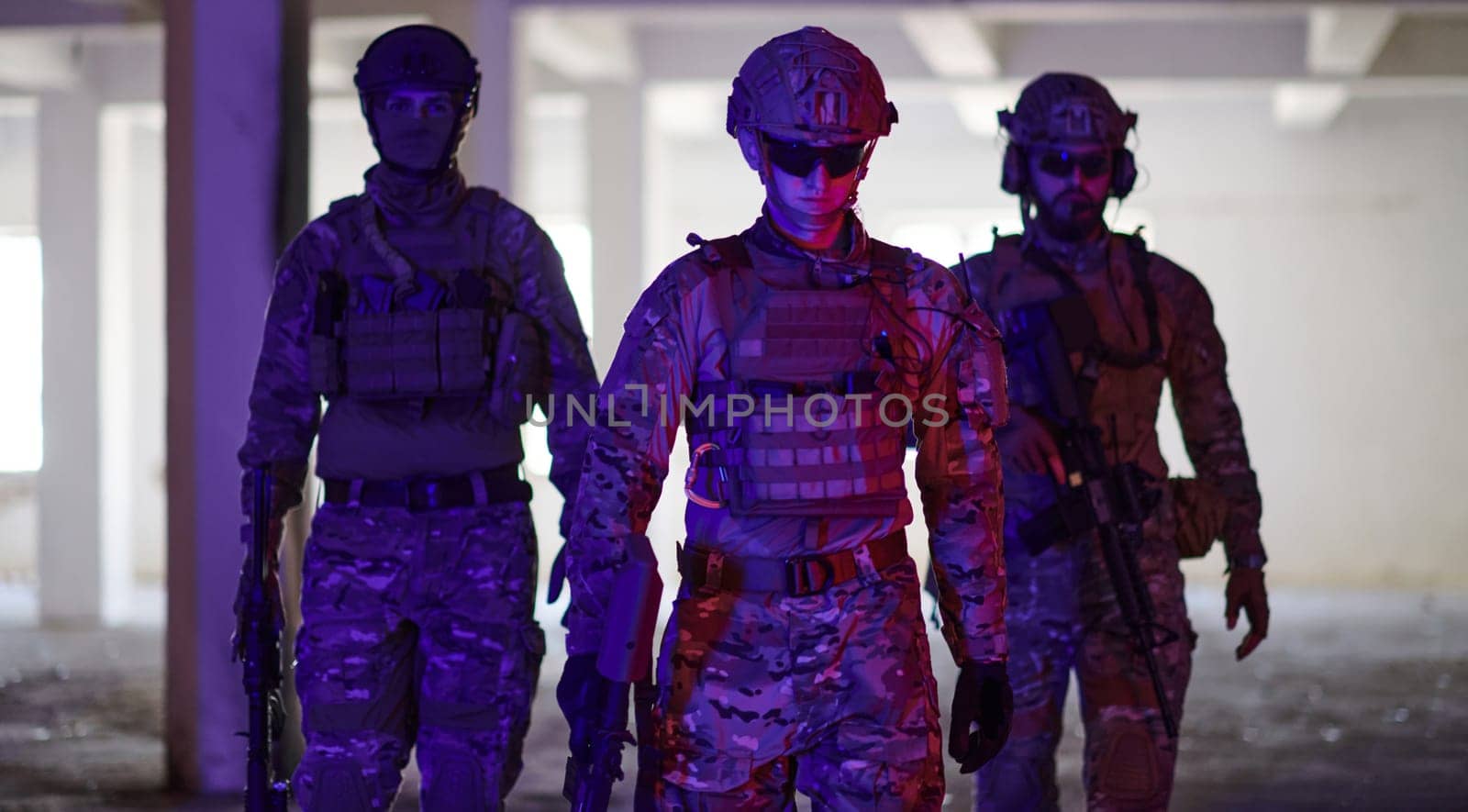 soldier squad team walking in urban environment colored lightis.