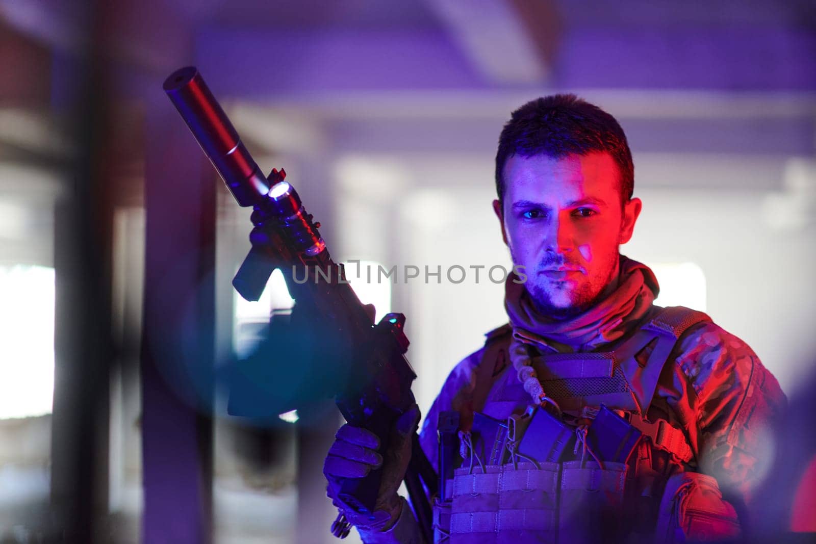 A professional soldier undertakes a perilous mission in an abandoned building illuminated by neon blue and purple lights by dotshock