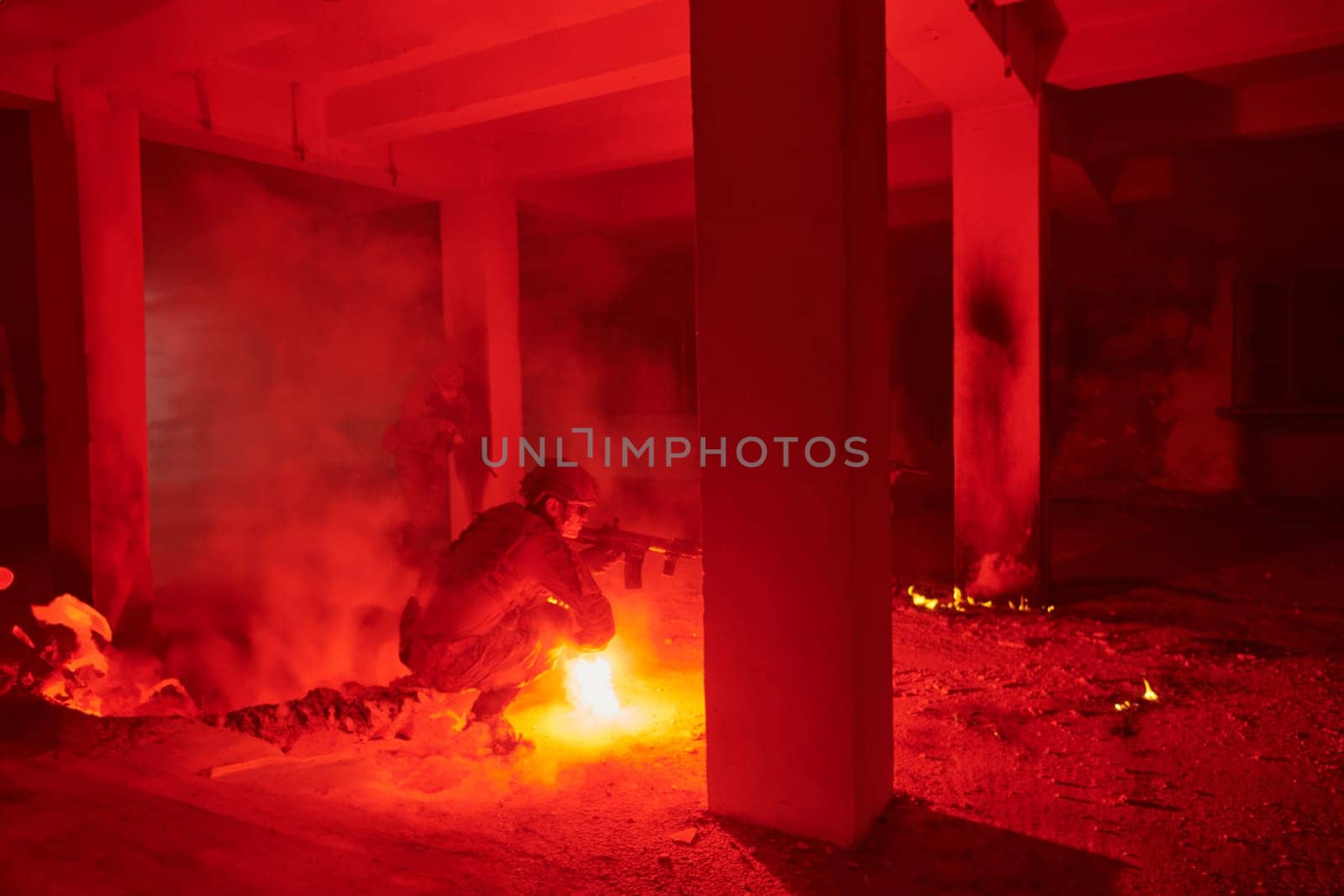 A professional cameraman captures the intense moments as a group of skilled soldiers embarks on a dangerous mission inside an abandoned building, their actions filled with suspense and bravery.