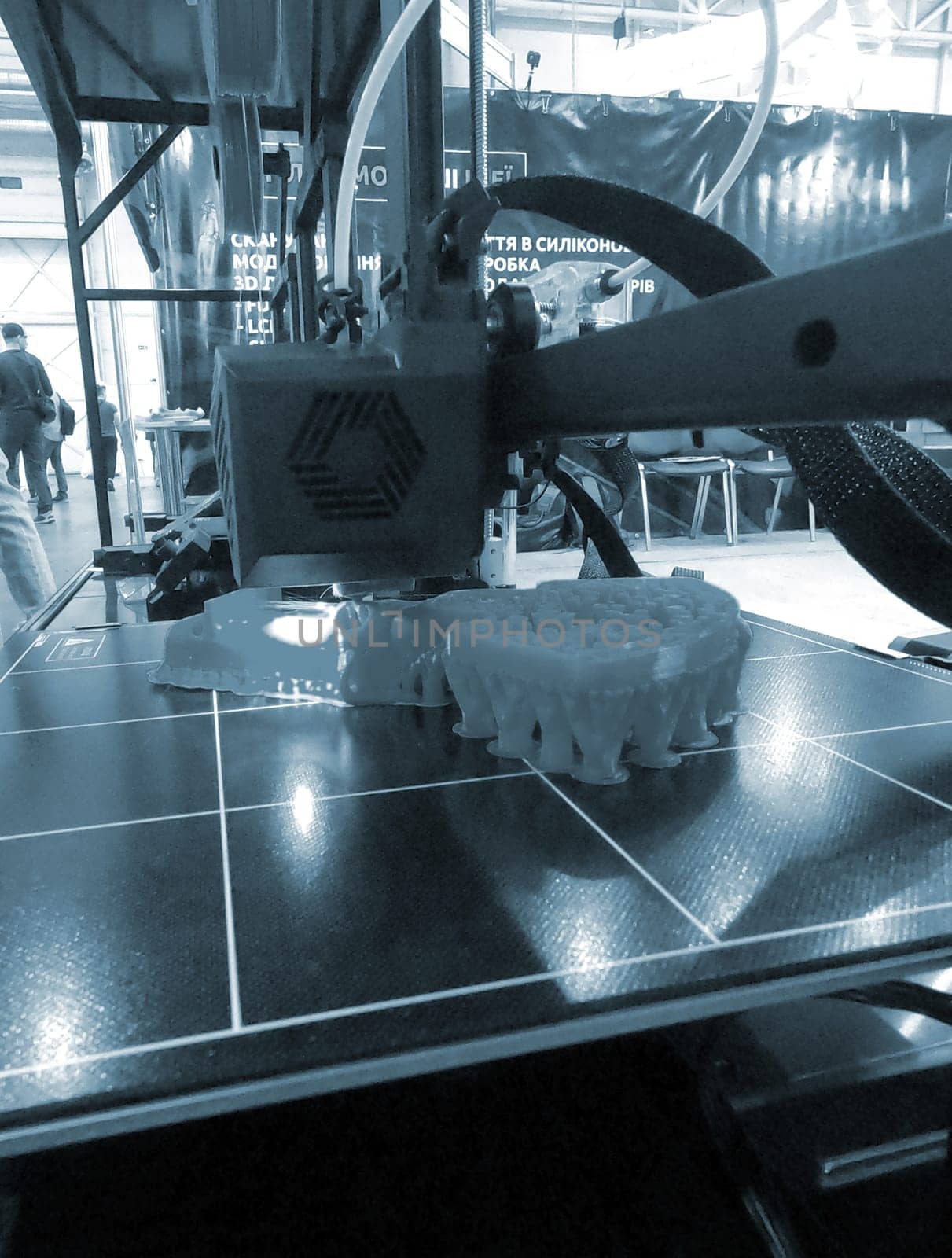 3D printer working close-up 3D printer prints a model from molten plastic by Mari1408