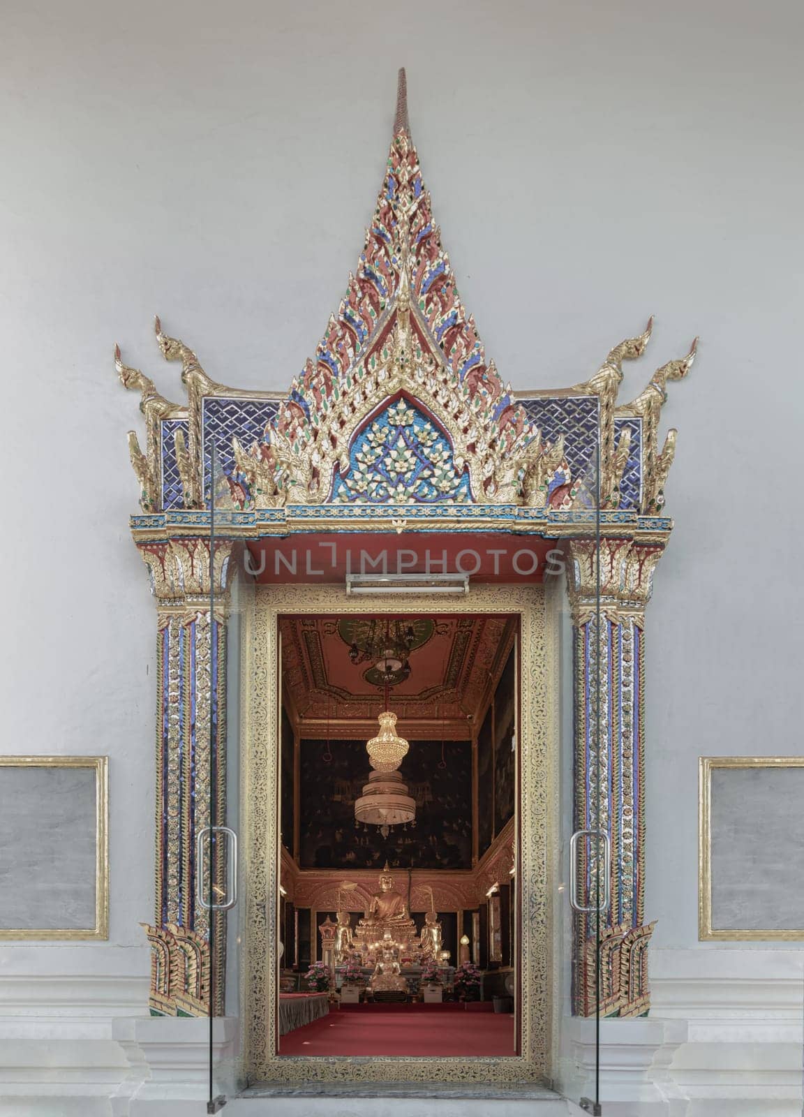 Bangkok, Thailand - Dec 21, 2019 - The Buddha image or Buddha statue in Phra ubosot at Wat Poramaiyikawas Worawihan, is the ancient and traditional Thai architechture since King Chulalongkorn the Great (Rama V). Space for text, Selective focus.