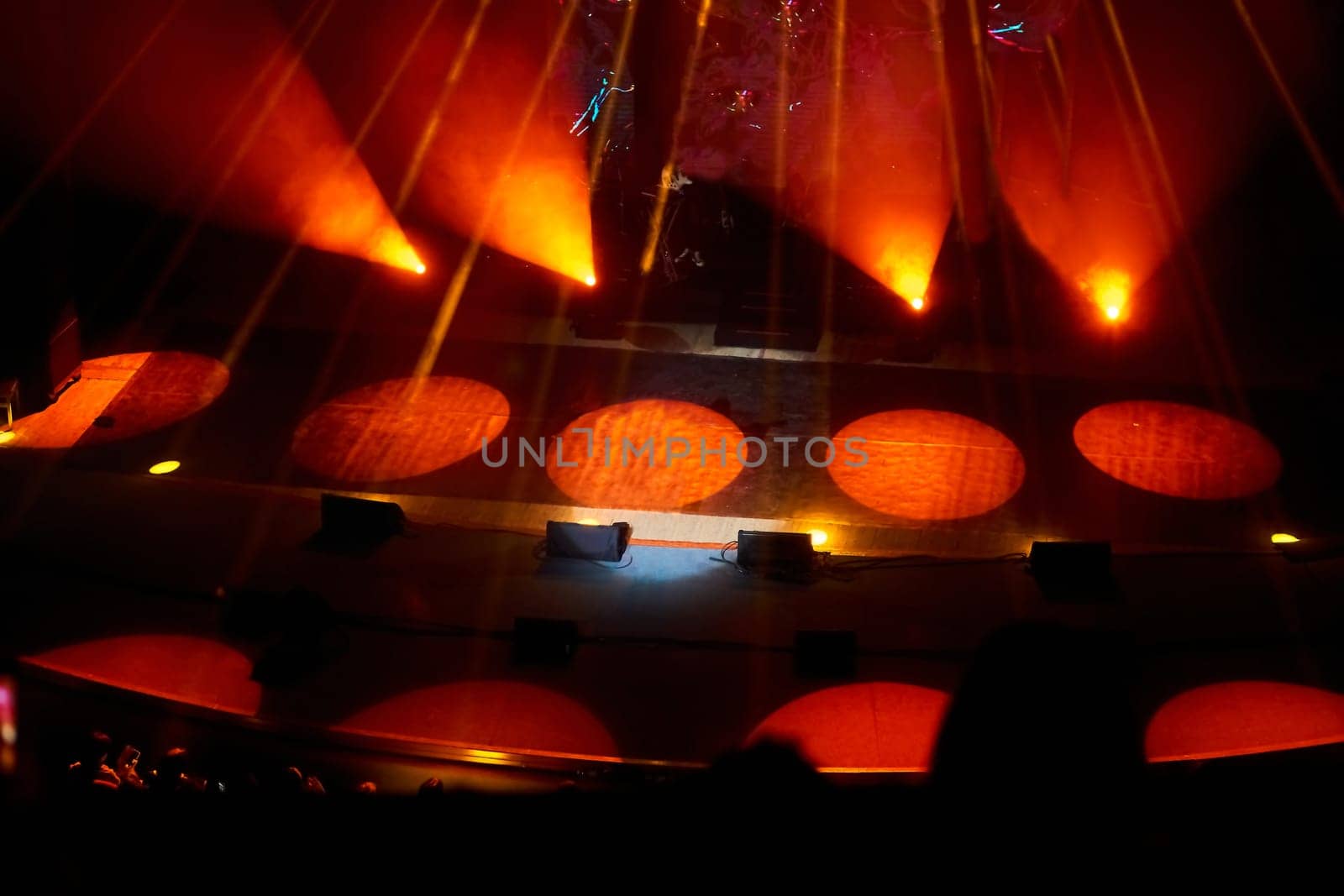 Concert show stage with red spotlights,backlight,music,musicians to perform by jovani68