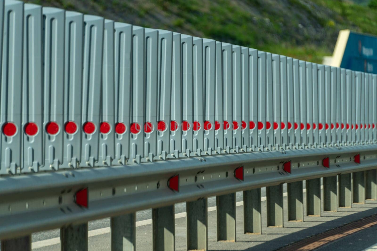 Safety barriers on highway. Anodized safety steel barrier. Enhancing highway safety. by Matiunina