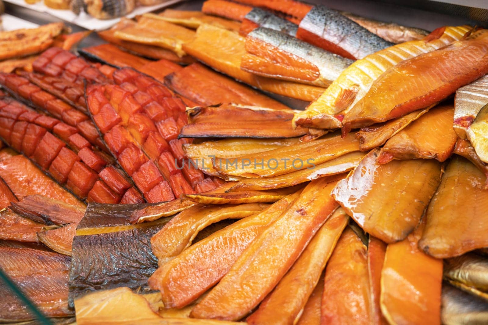 Various smoked fish products. Healthy eating and fish market concept