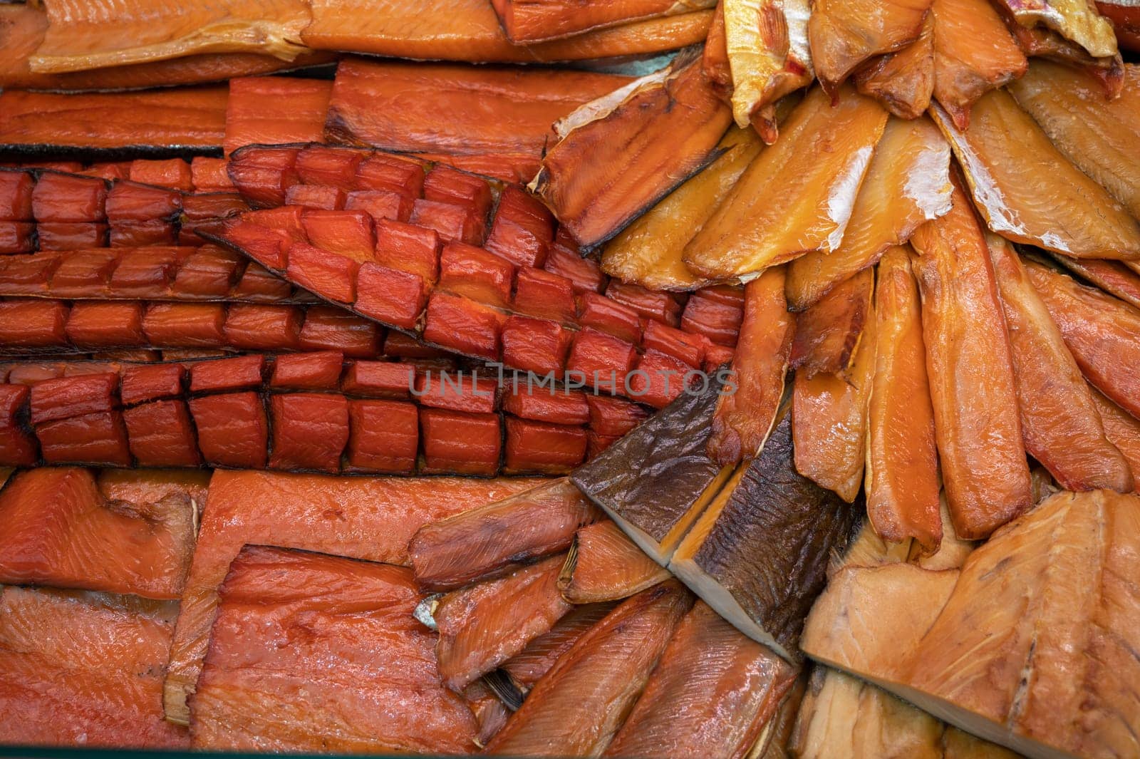 Various smoked fish products. Healthy eating and fish market concept