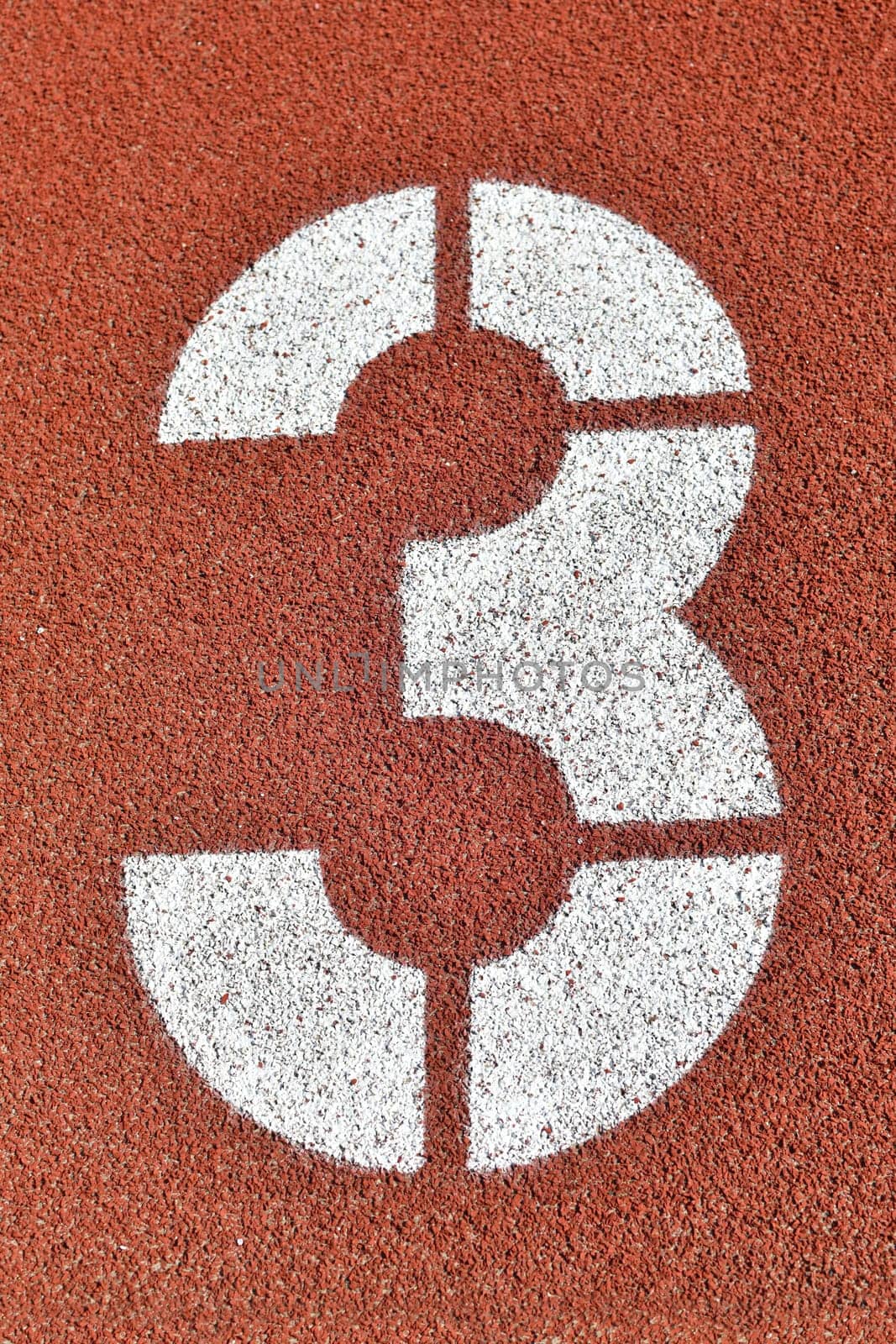 Number three on the red runway is numbered in a stadium