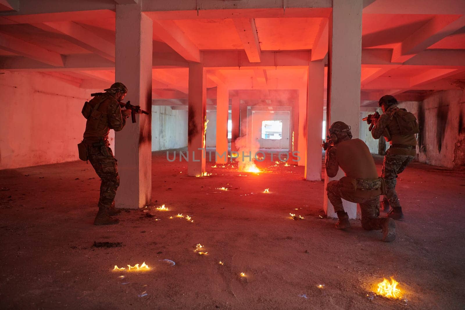 A group of professional soldiers bravely executes a dangerous rescue mission, surrounded by fire in a perilous building