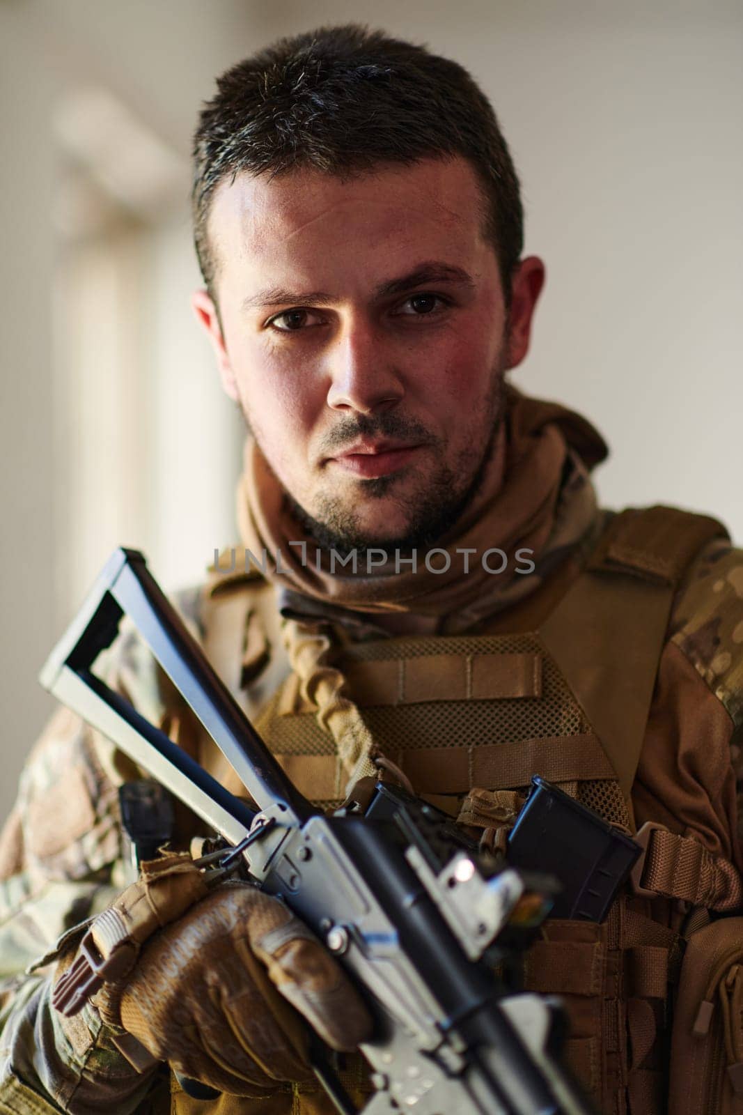 Modern warfare soldier portrait in urban environment.