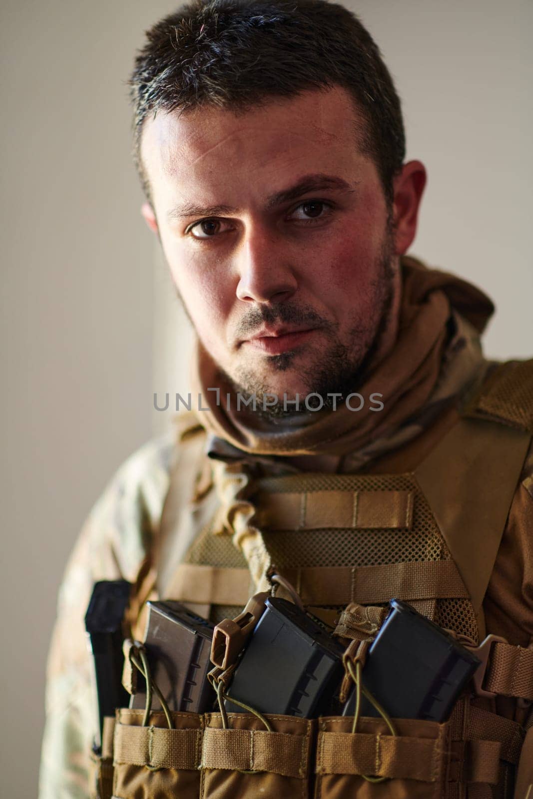 Modern warfare soldier portrait in urban environment.