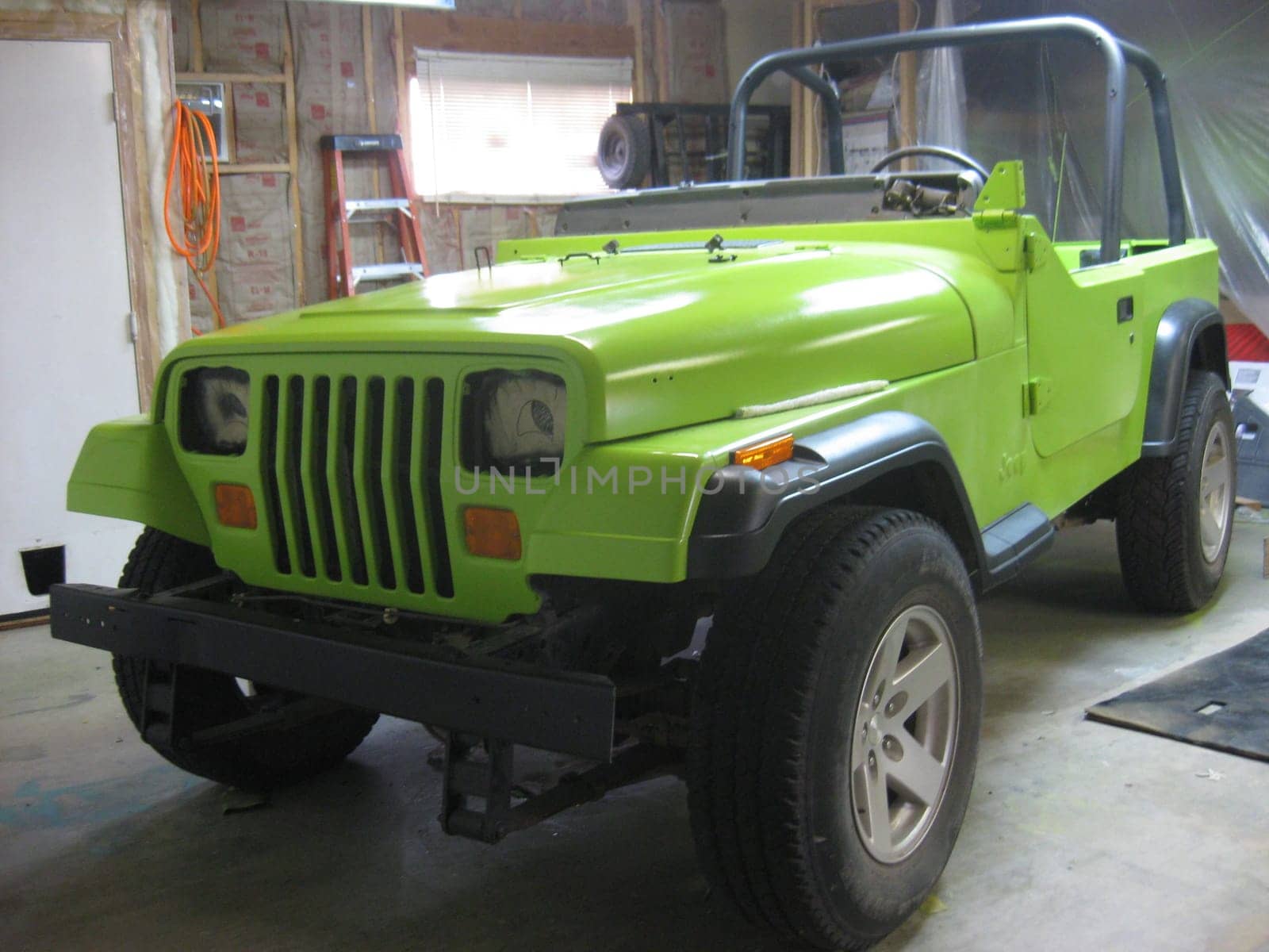 Vehicle with Eyes for Headlights, Lime Green Paint Job, 1990s Vehicle . High quality photo