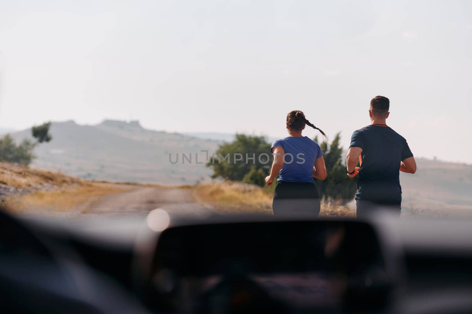 Romantic Couple Running Outside, Captured from Car by dotshock