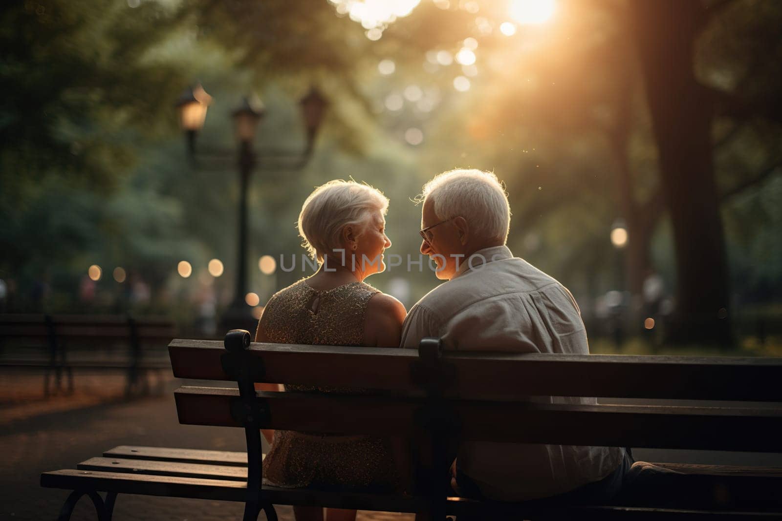 Elderly Couple Sitting On A Bench In The Park, Concept Of Happiness In Old Age