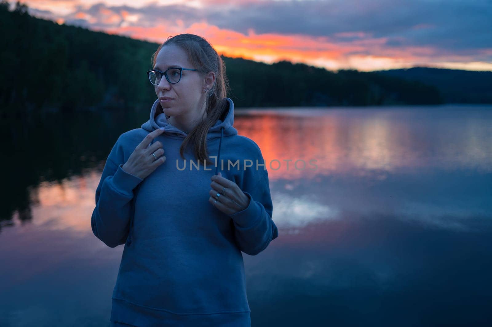 Woman on the pier, closeup portrait, beauty summer sunset