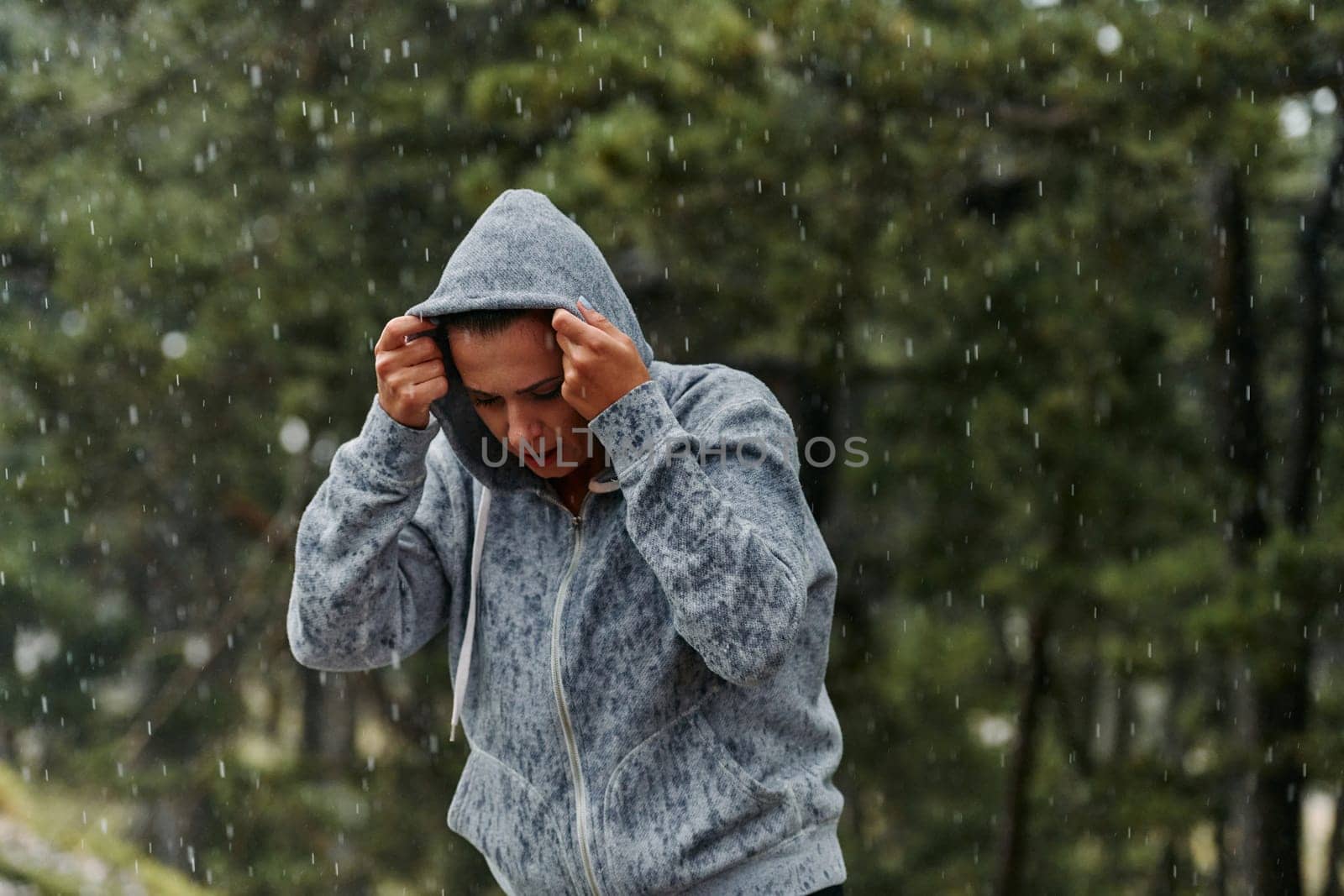 Beautiful Woman Enjoying Rainy Day After Intense Run by dotshock