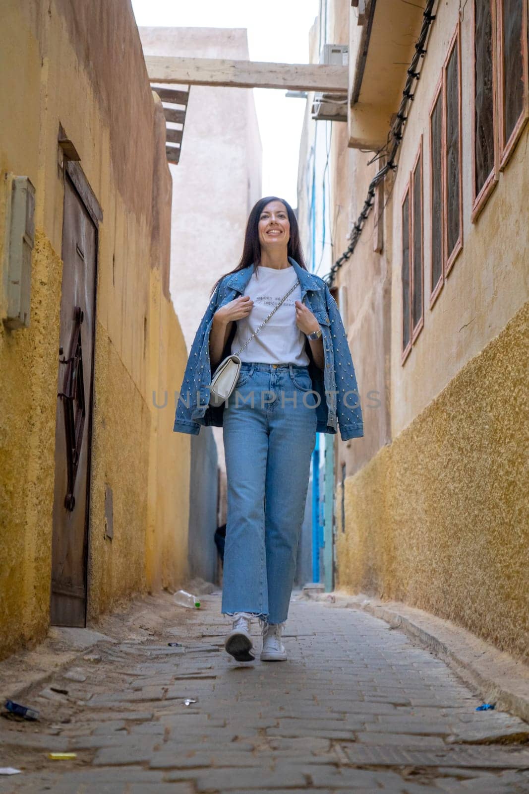 Young woman on the streets of Fez by LopezPastor