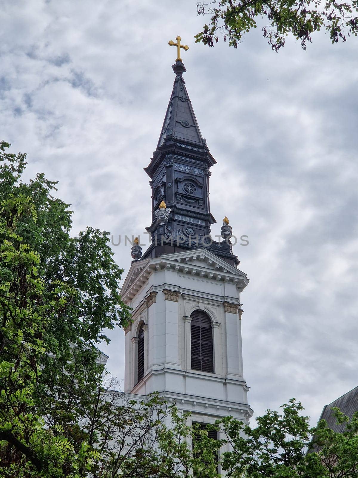 White dome of an church piercing the sky by zebra