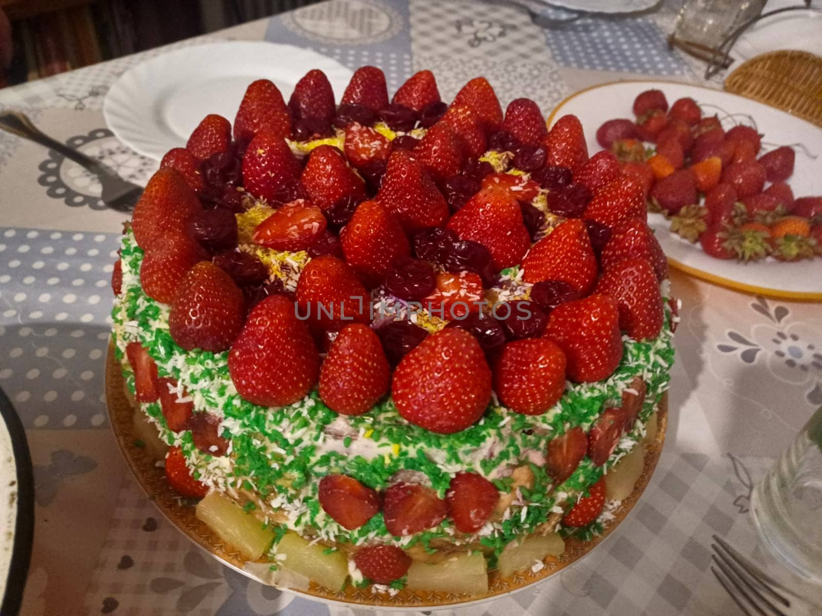 Delicious fruit cake with pineapples and strawberries.